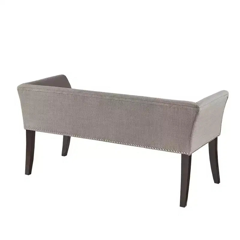 Banc en bois à piètement évasé et capitonné avec garniture cloutée 49,50