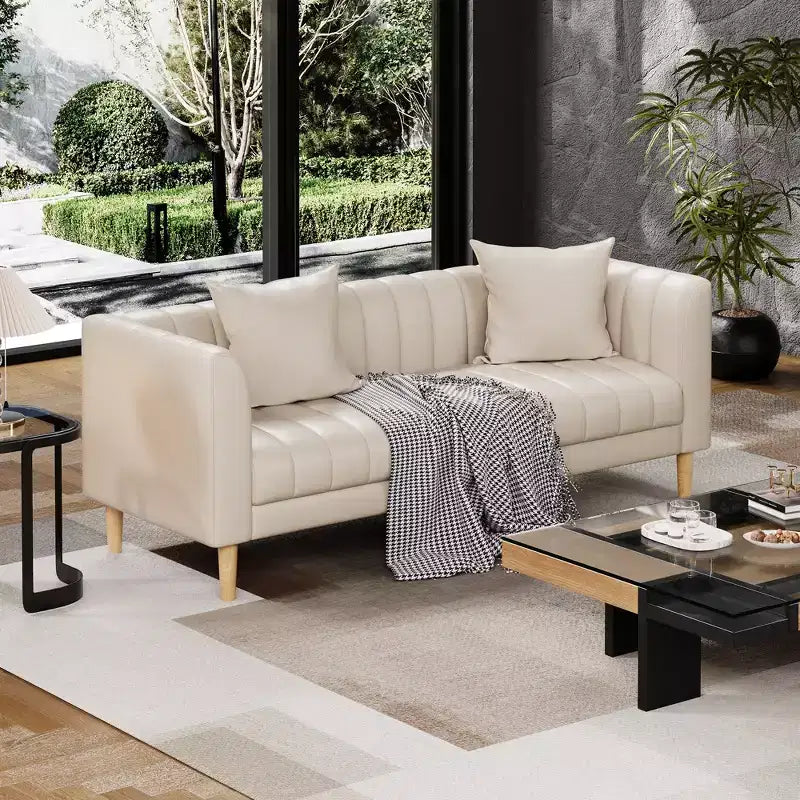 Canapé moderne en similicuir 83, 3 places avec assise profonde et pieds en bois, coussins ergonomiques et 2 coussins décoratifs pour salon, chambre ou appartement