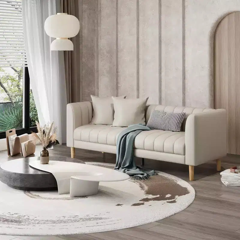 Canapé moderne en similicuir 83, 3 places avec assise profonde et pieds en bois, coussins ergonomiques et 2 coussins décoratifs pour salon, chambre ou appartement